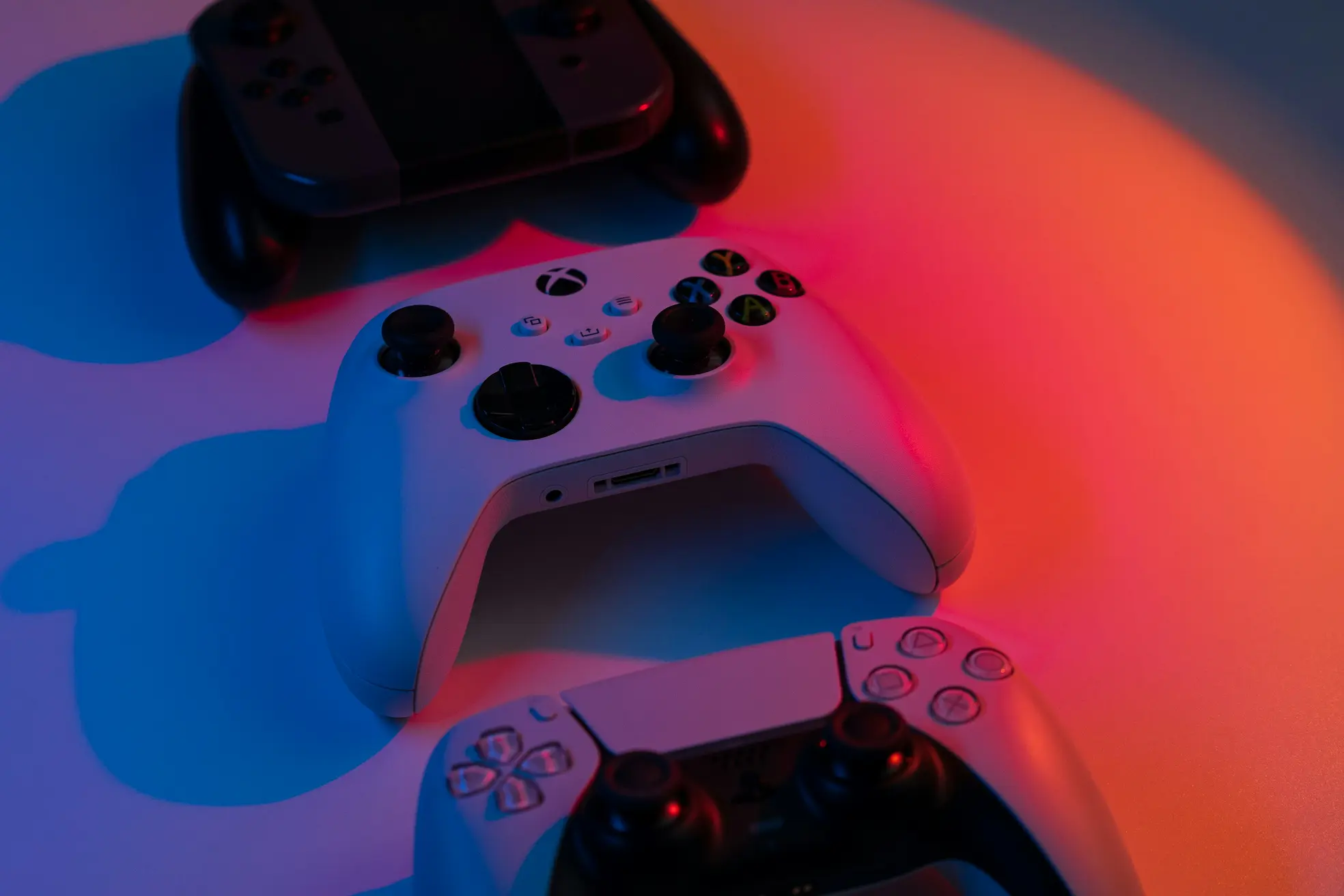  Photo by <a href='https://unsplash.com/photos/two-video-game-controllers-sitting-next-to-each-other-r4iput0KsOw'>Eugene Chystiakov</a> from Unsplash