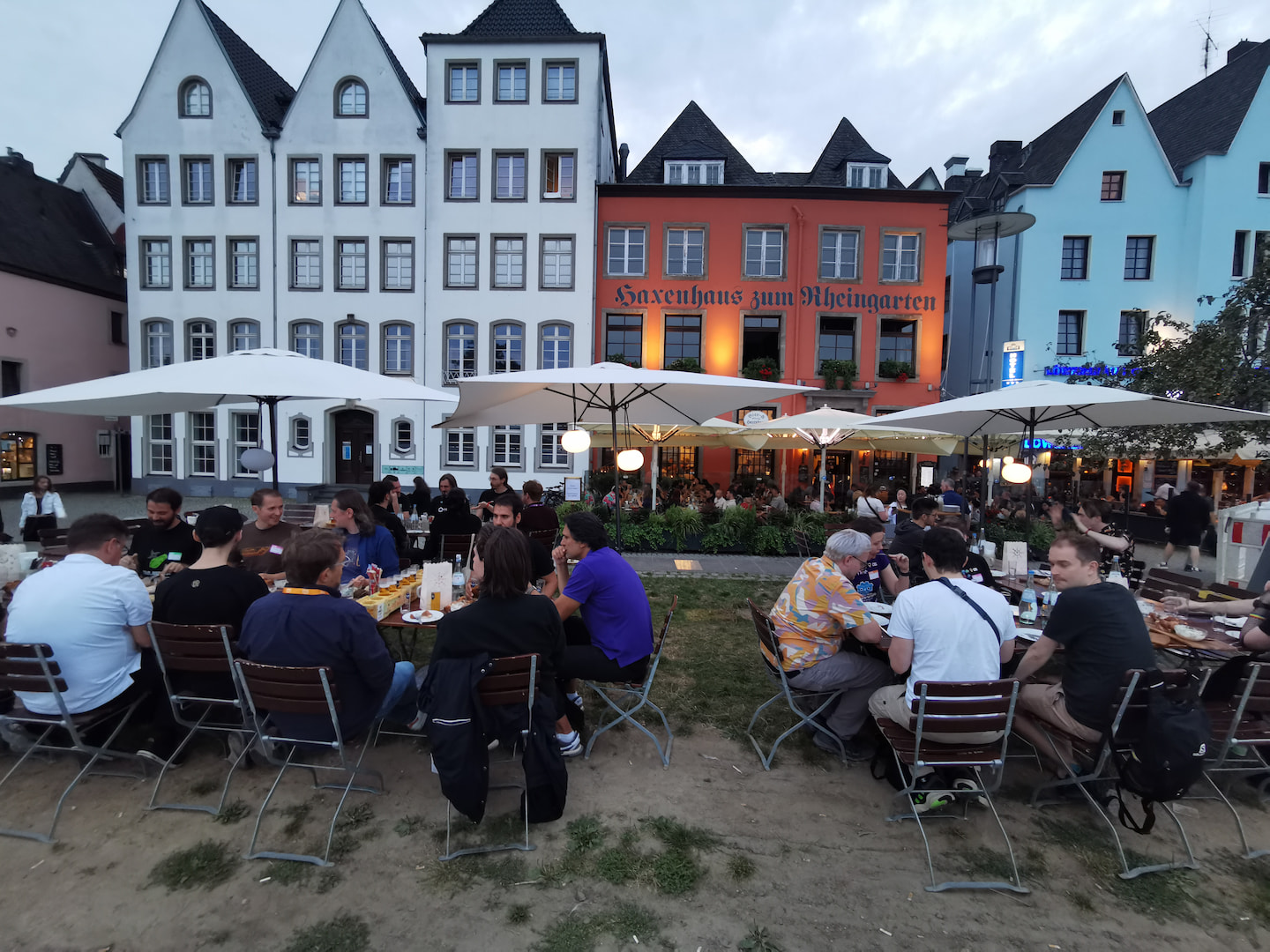 Attendees sitting down to have dinner